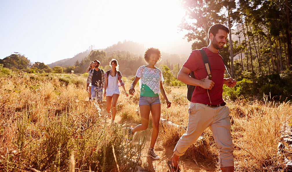 Group of young adults hiking.