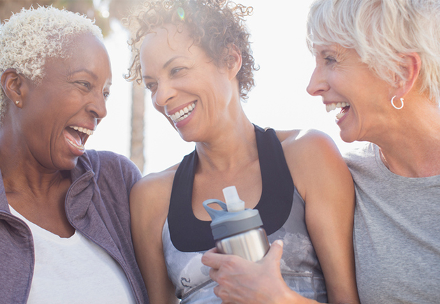 3 older women enjoying being active outdoors.
